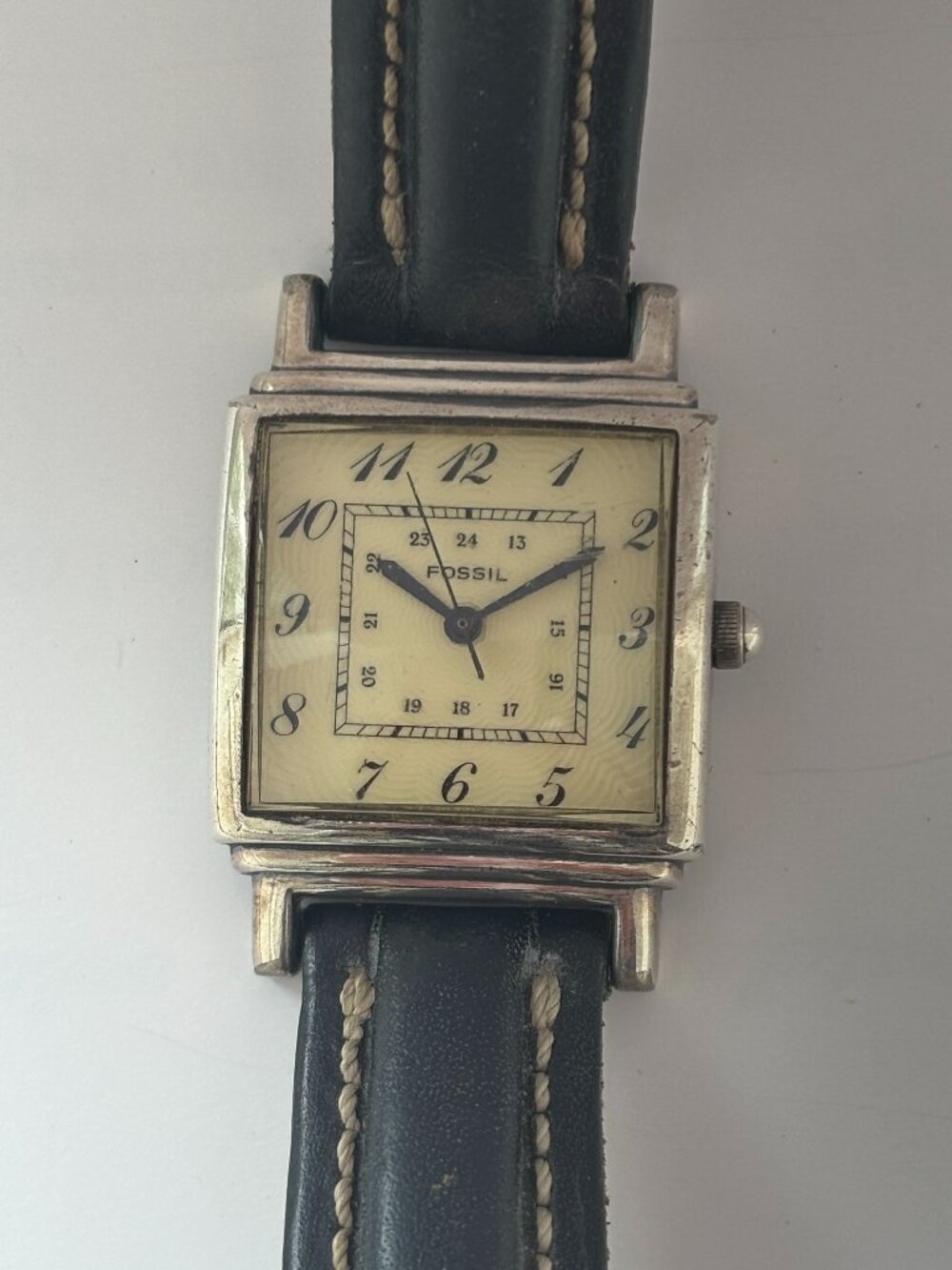 Vintage Fossil watch in Art Deco style with silver bezel and square face
